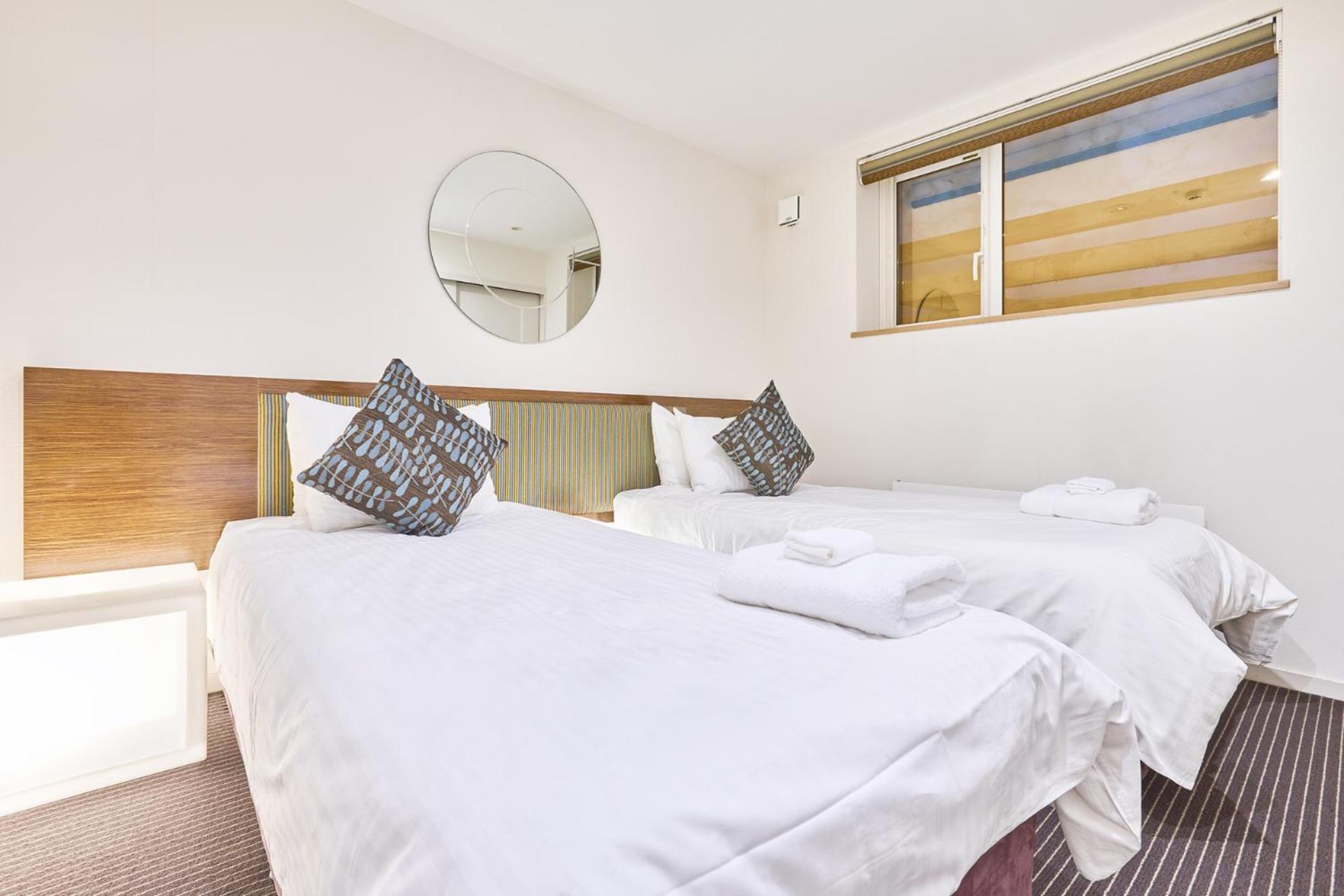 Niseko Central Houses And Apartments Кучан Стая снимка